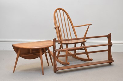 Lot 2123 - ERCOL; a light oak drop-leaf table, height...