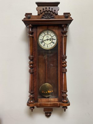 Lot 2304 - A walnut cased Vienna style wall clock, with...