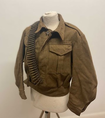 Lot 217 - A WWII British 1940 battle dress tunic, size 9,...