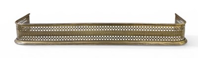 Lot 596 - An early 20th century pierced brass fire...