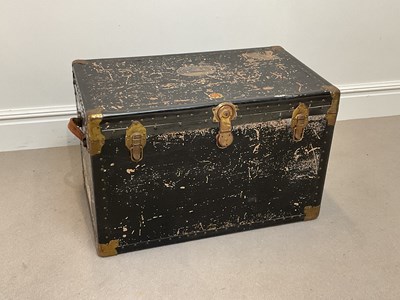 Lot 2076 - A black painted brass mounted travel trunk,...