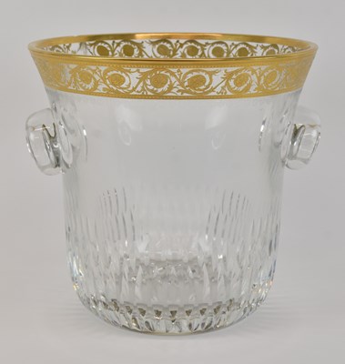 Lot 708 - SAINT-LOUIS; a cut crystal glass twin handled...