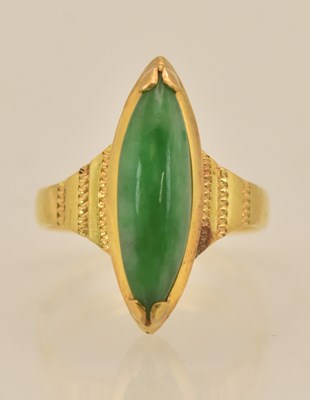 Lot 1290 - A Chinese yellow metal marquise green jade...