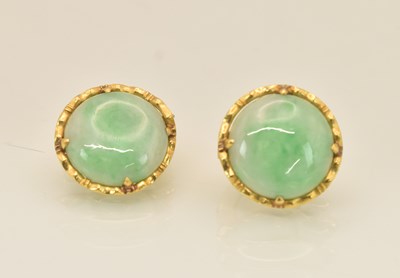 Lot 1442 - A pair of Chinese yellow metal circular green...