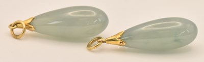 Lot 1425 - A pair of Chinese yellow metal green jade...