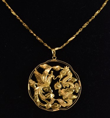 Lot 1359 - A large Chinese 22K yellow gold circular open...