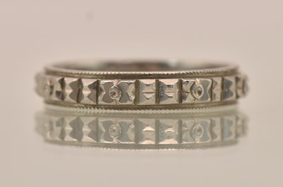 Lot 1288 - A Chinese platinum band ring, with Chinese...