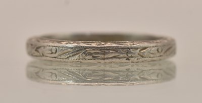 Lot 1317 - A Chinese platinum band ring, with Chinese...