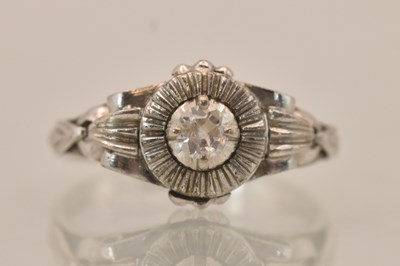 Lot 1271 - An 18K white gold diamond solitaire ring, the...