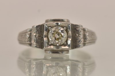 Lot 1272 - A white metal diamond solitaire ring, the...