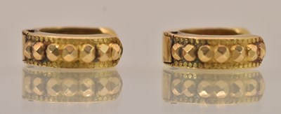 Lot 1441 - A small pair of Chinese yellow metal hoop...