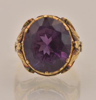 Lot 1273 - A yellow metal synthetic purple corundum set...