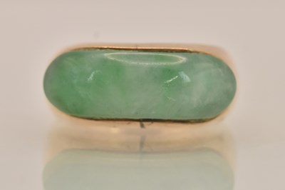 Lot 1313 - A Chinese yellow metal green carved jade set...
