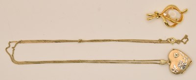 Lot 1422 - A 9ct yellow gold heart shaped locket pendant...
