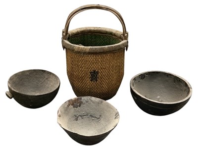 Lot 1054 - Three African tribal carved wooden circular...