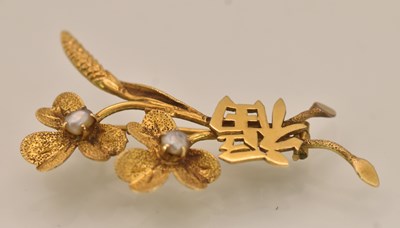 Lot 1472 - A Chinese yellow metal floral spray brooch set...