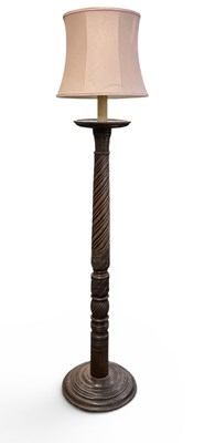Lot 140 - A late 19th century turned mahogany torchère...
