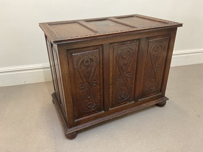 Lot 2098 - A reproduction carved and panelled oak blanket...