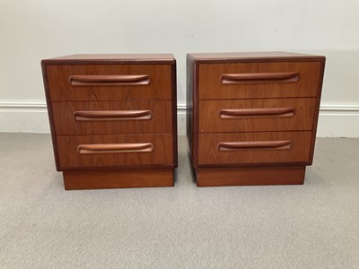 Lot 2115 - G PLAN; a pair of three drawer bedside...