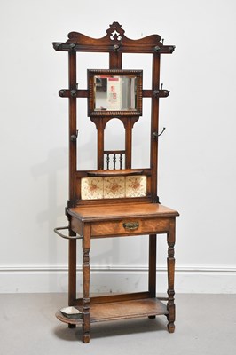 Lot 2059 - An Edwardian oak hall stand, height 193cm,...