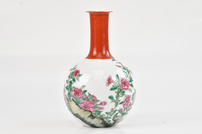 Lot 1011 - A Chinese porcelain Famille Rose bottle vase,...