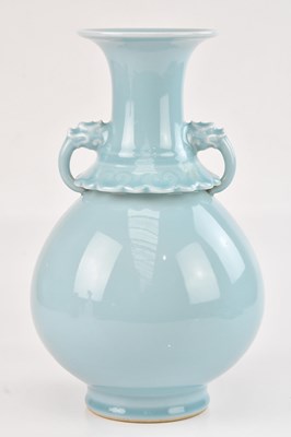 Lot 1004 - A Chinese monochrome twin handled vase of...