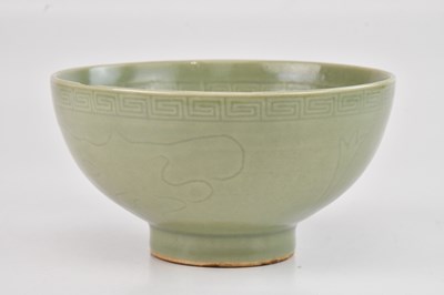 Lot 1098 - A Korean footed celadon glazed bowl with...