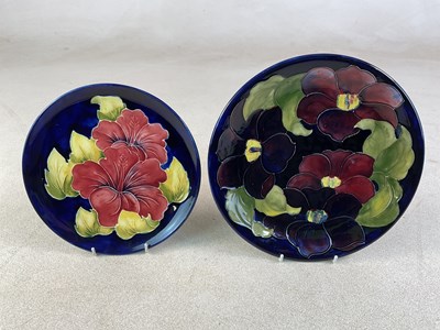 Lot 253 - MOORCROFT; two plates comprising a 'Clematis'...