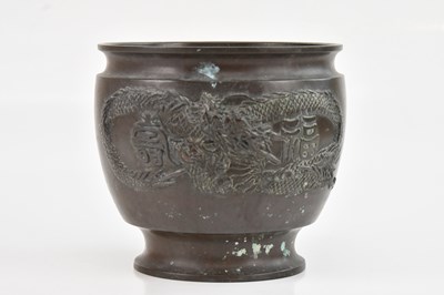 Lot 1024 - A Chinese bronze jardinière, decorated with...