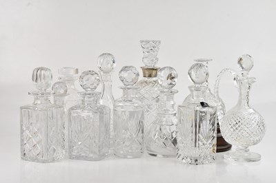 Lot 1437 - A collection of cut glass decanters including...