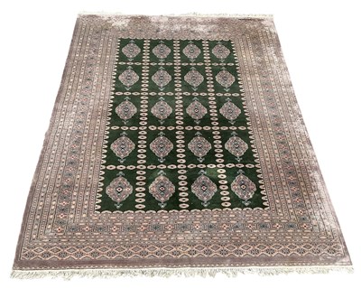 Lot 120 - A handwoven wool pile Bokhara carpet, with...
