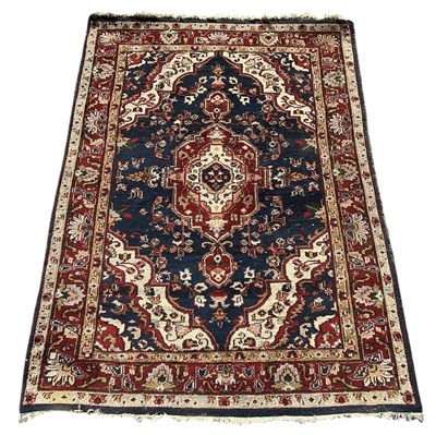 Lot 125 - A modern machine made Persian style wool pile...