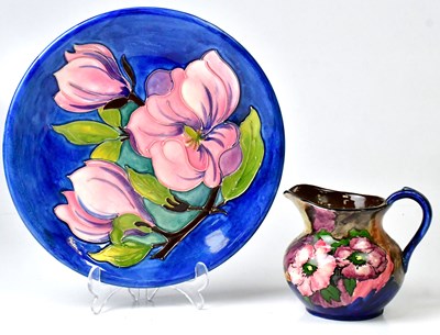 Lot 261 - MOORCROFT; a Magnolia pattern plate, impressed...