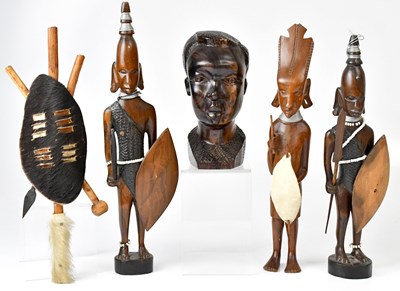 Lot 293 - Five African wooden carved figures and busts,...