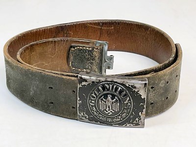 Lot 220 - A WWI German leather belt with metal buckle,...