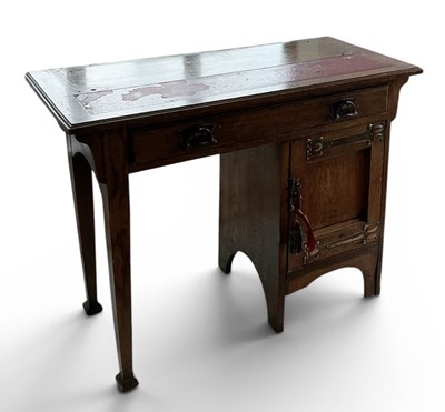 Lot 60 - An early 20th century Arts and Crafts oak...