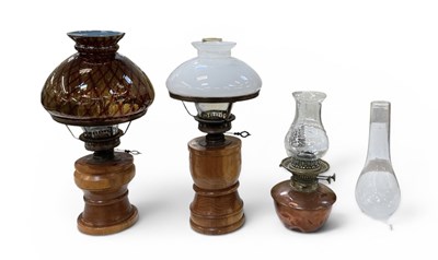 Lot 137 - An early 20th century copper oil lamp, with...