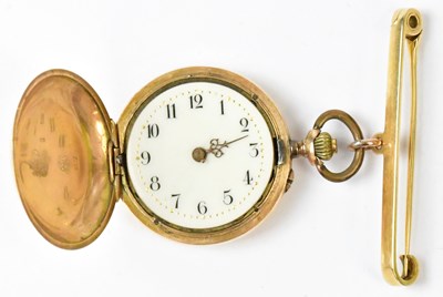 Lot 1125 - A 14ct yellow gold fob watch, the white...