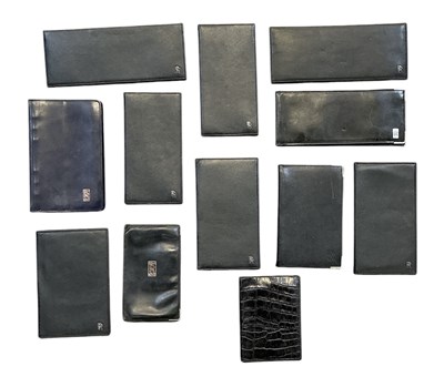 Lot 559 - ROLLS-ROYCE; eleven black leather wallets,...