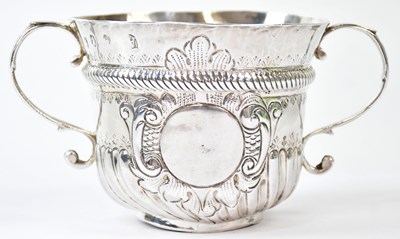 Lot 778 - A George I hallmarked silver twin-handled...