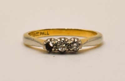 Lot 660 - An 18ct yellow gold and platinum diamond three...