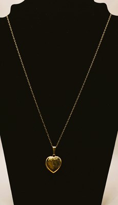 Lot 661 - A 9ct yellow gold heart shaped locket pendant,...
