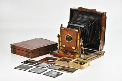 Lot A mahogany plate camera, with brass hardware,...