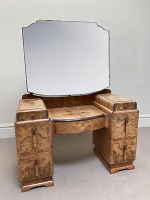 Lot 14 - An Art Deco walnut knee-hole dressing table...