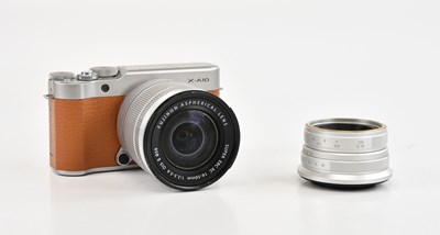Lot FUJIFILM; a X-A10 digital camera, with a...