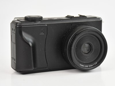 Lot SIGMA; a DP2 Merrill digital camera, with a...
