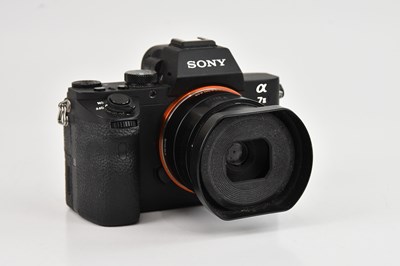 Lot SONY; an A7II mirrorless camera, with a Sigma...