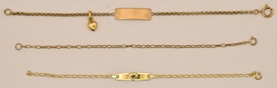 Lot 1515 - Three dainty 9ct yellow gold bracelets, two...