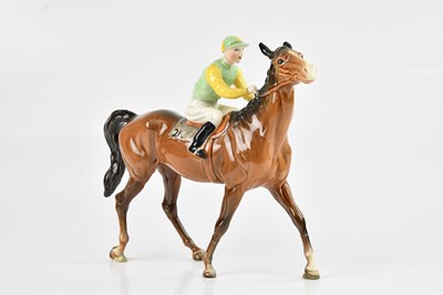 Lot 1235 - BESWICK; a ceramic model of a horse and jockey,...