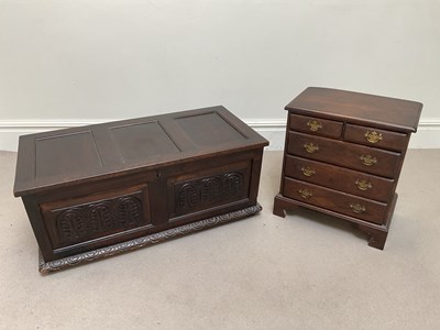 Lot 2104 - A reproduction small size oak chest of two...